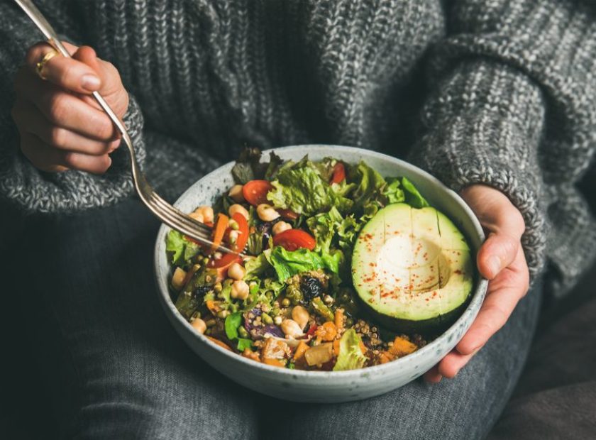 Healthy,Vegetarian,Dinner.,Woman,In,Jeans,And,Warm,Sweater,Holding